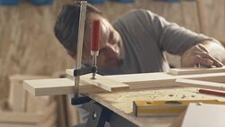 Carpenter clamping pieces of wood Stock Footage