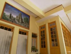  MS Painting hanging above a doorway depicting Buddhist temple  / Dharamsala, Himachal Pradesh, India Stock Footage