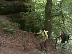 WS PAN View of hikers hiking in forest / Kastel-Staadt, Rhineland-Palatinate, Germany Stock Footage
