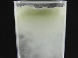 Fizzy Antacid Powder Pouring Into Glass Stock Footage