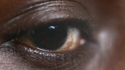ECU Moving eye of an African-American person Stock Footage