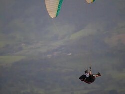 WS Shot of Para glider flying in air over mountain hill / Belo Horizonte, Minas Gerais, Brazil Stock Footage