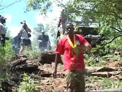 Car rally raises funds for fence to protect endangered rhinos News Clip