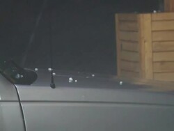 CU ZO ZI Shot of hail and rain hitting hood of car / Lemmon, South Dakota, United States Stock Footage