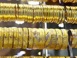 Golden bracelets on window display Stock Footage