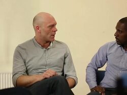 Man shares at group therapy session- DOLLY Stock Footage