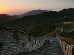 WS T/L View of Sun rising over Great Wall stone fortifications, Mutianyu / Beijing, Hebei Province, China Stock Footage