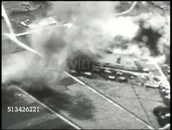 1944: CAROLINE ISLANDS BOMBING:  VS Squadron of B-24 Liberator bombers of the Seventh Air Force (7th Air Force) &amp; Thirteenth Air Force (13th Air Force) flying, dropping bombs over Truk Islands, explosions, heavy smoke. WWII, Pacific Front Instructional Video