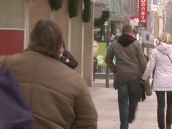 WS People walking on sidewalk at Tauentzienstrasse during winter / Berlin, Germany Stock Footage