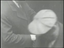 Unemployed workers accept charity during the Great Depression. News Clip