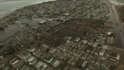 An aerial view shows the widespread destruction after a fire destroyed 80 to 100 buildings in a tiny beachfront neighborhood told to evacuate before Sandy hit New York News Clip