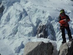 Pan Mountaineer using GPS  in high mountains/French Alps Stock Footage