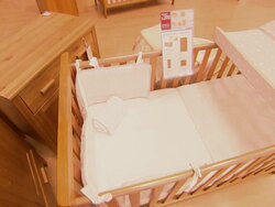 Cots and pushchairs inside Mothercare News Clip