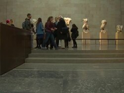 Tourists viewing the Parthenon marbles at the British Museum News Clip