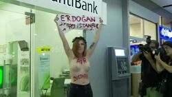 CLEAN : A topless Femen activist demonstrates News Clip