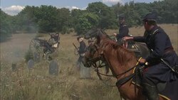 Union army soldiers take cover behind gravestones during a Civil War battle. Stock Footage