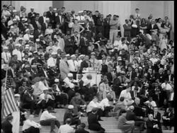 B/W August 28, 1963 Martin Luther King, Jr. giving speech in crowd / March on Washington Stock Footage
