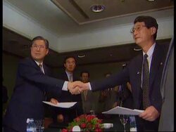 China - Koreas reach agreement on food aid News Clip
