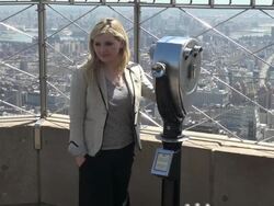 Abigail Breslin poses for photographers on the 86th floor observatory of the Empire State Building for Project Sunshine Stock Footage