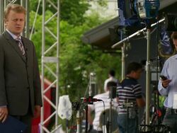 MS Shot of television news crews working outside during G8 meeting / Hokkaido Toyako, Japan Stock Footage