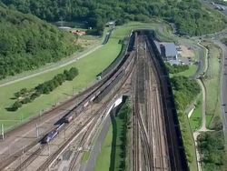Eurotunnel trains driving into Channel Tunnel News Clip