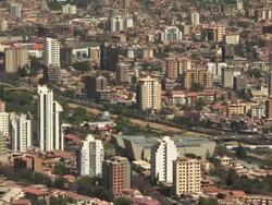 Residential/commercial area with motorway and large roads overview, Cochabamba, Bolivia Stock Footage