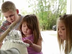 CU Group of young kids building a robot with recycled materials. Stock Footage