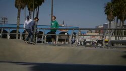 teenager skating through skatepark and snake run venice California skatepark Stock Footage