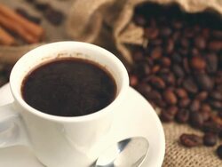 Pouring fresh hot coffee in a cup Stock Footage