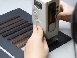 measure on right way of sample with Color Meter Stock Footage