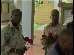 Families of victims arrive at morgue, memorial at cemetery News Clip