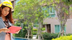 Construction manager checking real estate by tablet Stock Footage