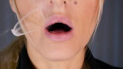 Smoke from female mouth Stock Footage