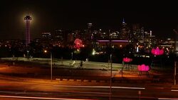 Downtown Denver Colorado skyscrapers highway traffic amusement park moon time-lapse Stock Footage