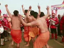 MS Shot of sadhus dancing in procession during kumbh mela / Allahabad, Uttar Pradesh, India Stock Footage