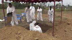 VOICED : Sepulto cuerpos anonimos en Colombia hoy ayuda a desenterrarlos News Clip