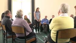 Group Therapy Support - Young woman shares with other people Stock Footage