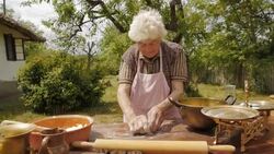 Cooking With Grandma-Old Farmer Lady Making a Loaf of Bread Stock Footage