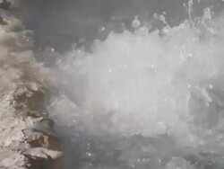 MS ZO Boiling water from ground / Yellowstone National Park, Wyoming, United States Stock Footage