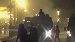 Army forces use volleys of tear gas to clear protesters from Tahrir Square News Clip
