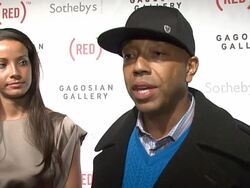 Bono and Damien Hirst Paint the Town Red For Aids In Africa - The (RED) Auction Stock Footage