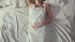 Portrait Of A Sad Woman Lying In Bed Stock Footage