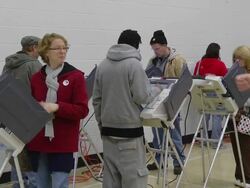 MS PAN Voters cast ballots at computer terminals during presidential election / Sylvania, Ohio, United States  Stock Footage