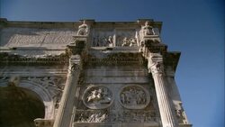 Statues top tall pillars on Rome's Arch of Constantine. Stock Footage