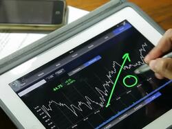Businessman using Tablet analysis stock data. Stock Footage