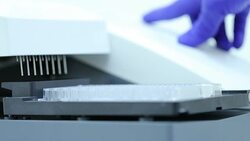 96 well plates on the Plate washer in laboratory Stock Footage