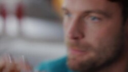 Guys sitting on couch watching tv and cheering Stock Footage