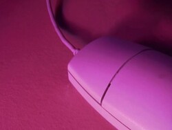 Hand clicking computer mouse Stock Footage