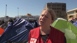 Migrants board bus in Athens to go to new camp Instructional Video