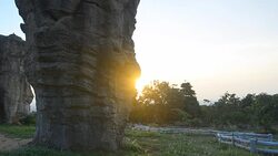 panning: first sunlight in Mo Hin Khao Chaiyaphum Stone Henge of Thailand Stock Footage